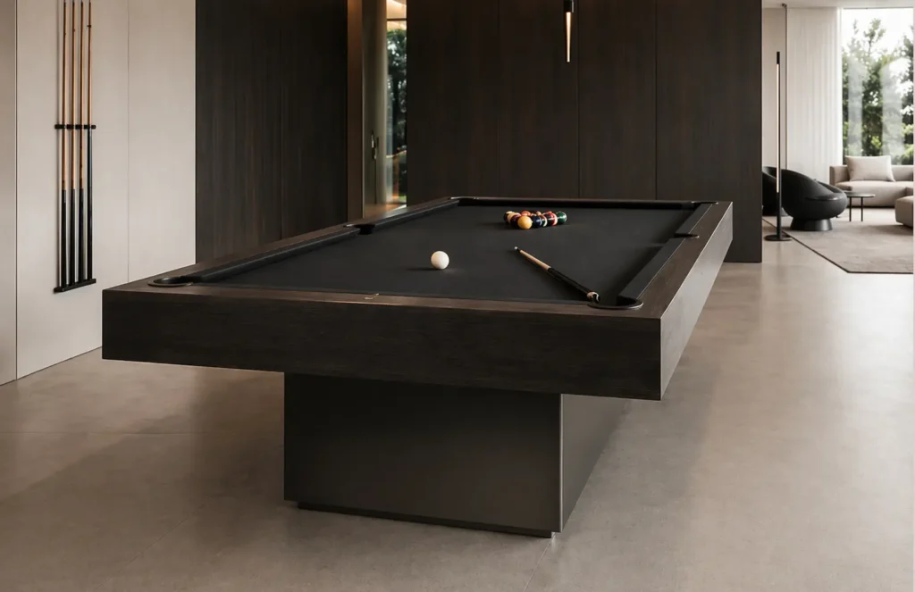 Modern luxury pool table with billiard balls and cue in a contemporary interior.