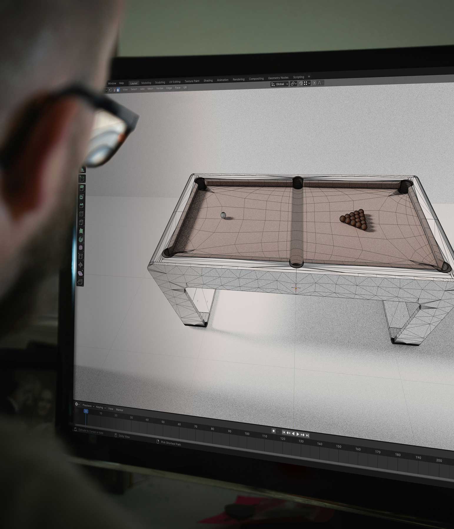 3D modeling of a modern pool table displayed on a computer screen.