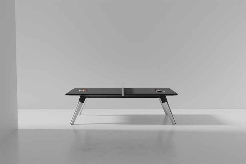 Black ONA table tennis table with a modern minimalist design displayed in a bright studio setting.
