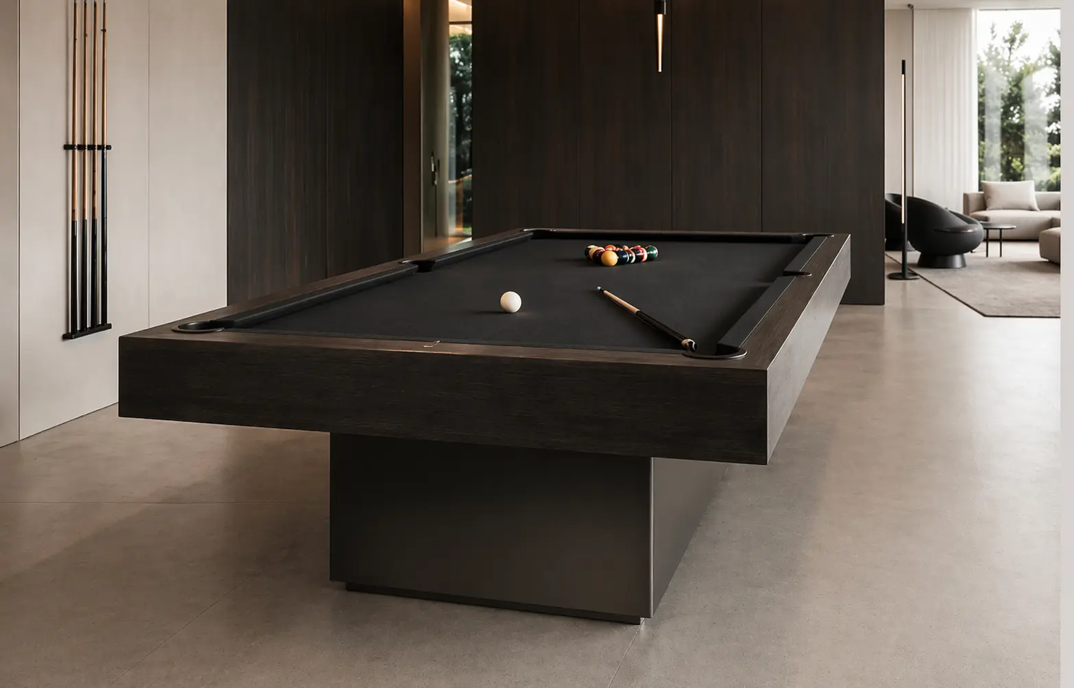 Luxury black pool table with billiard balls and cue in a sophisticated modern interior.