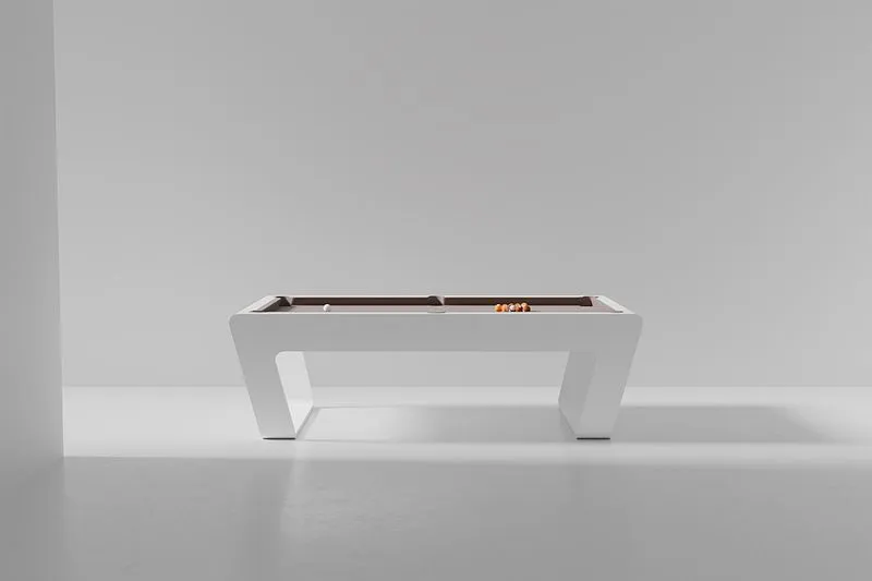 White COR billiard table with a modern minimalist design displayed in a bright studio setting.