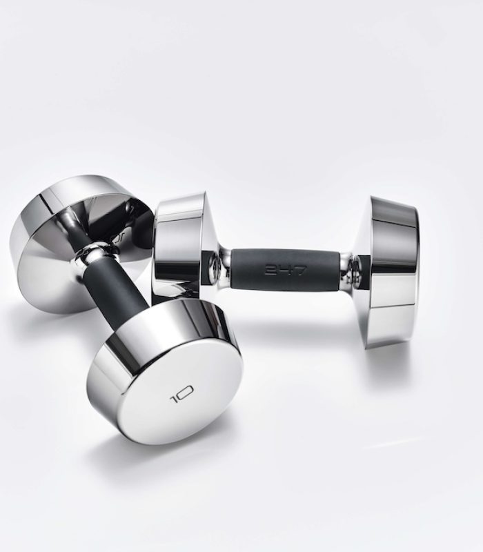 Chrome-finished 10 kg dumbbells with black ergonomic handles on a white background.